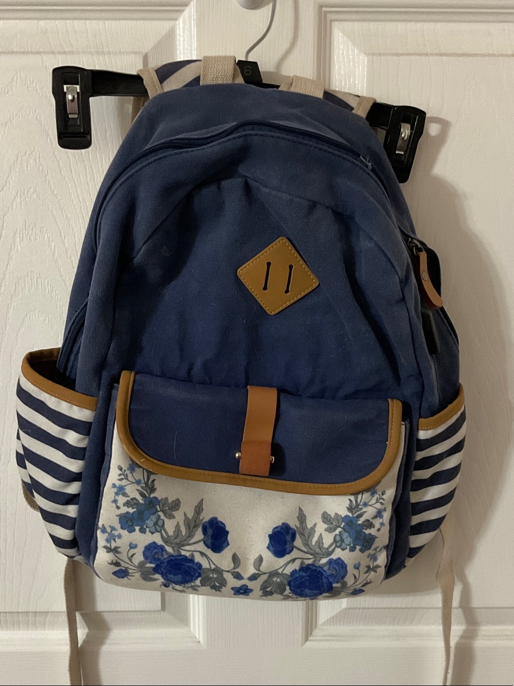 Navy Floral Canvas Backpack with Striped Side Pockets
